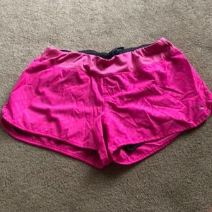 Bright pink athletic shorts